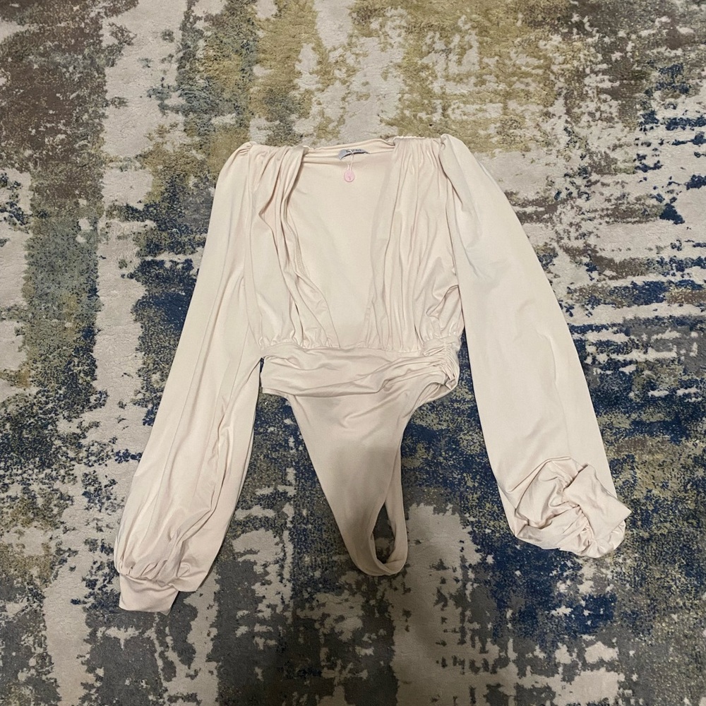 Oh Polly cream colored plunge long sleeve bodysuit.